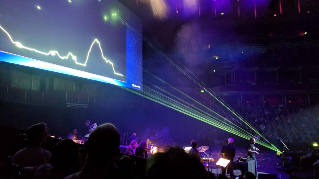 Laser beams render the arcade game "Lunar Lander" onto a large screen at the Royal Albert Hall