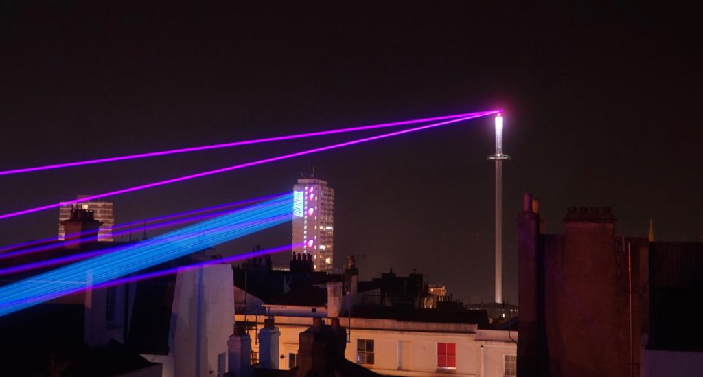 Lasers firing across the Brighton sky